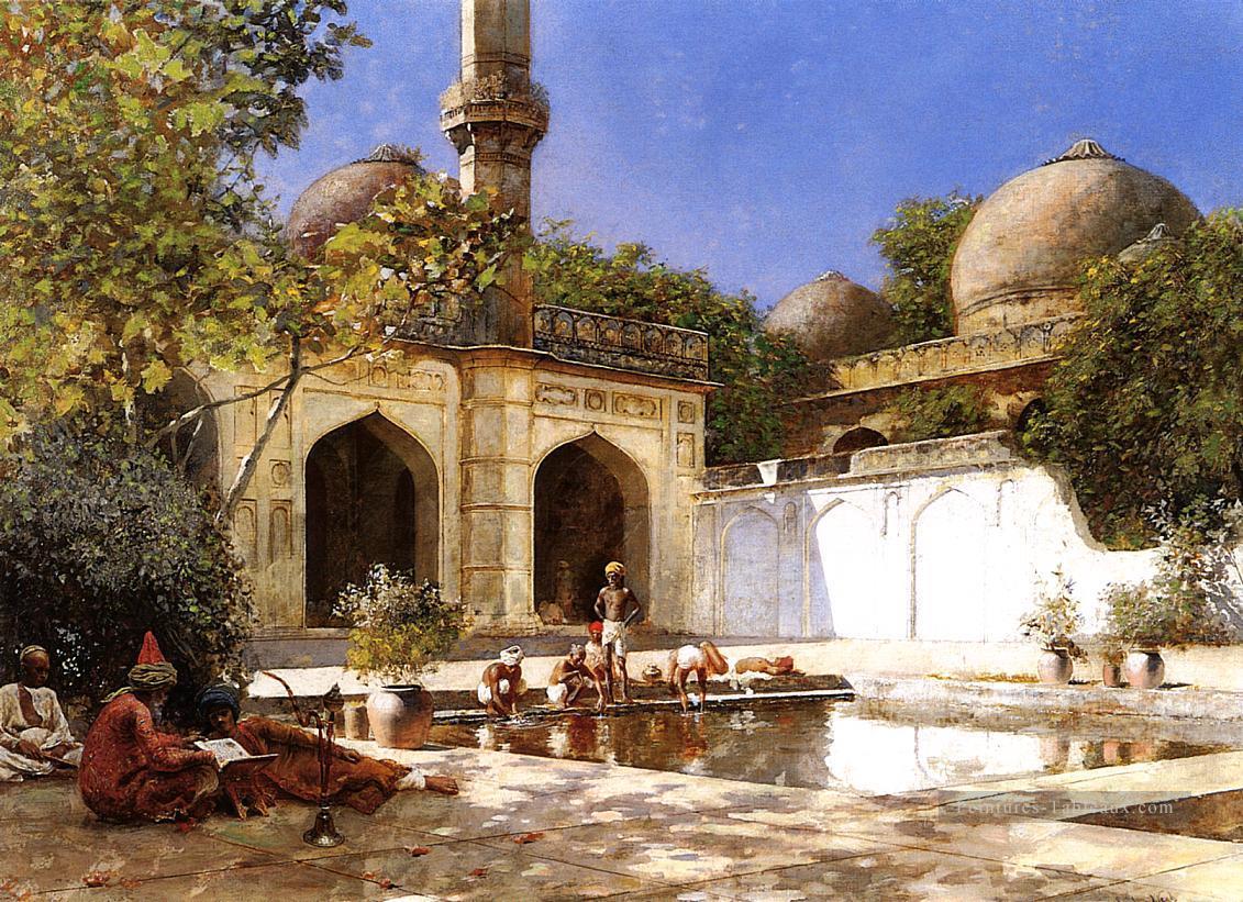 Figures dans la cour d’une mosquée Persique Egyptien Indien Edwin Lord Weeks Peintures à l'huile